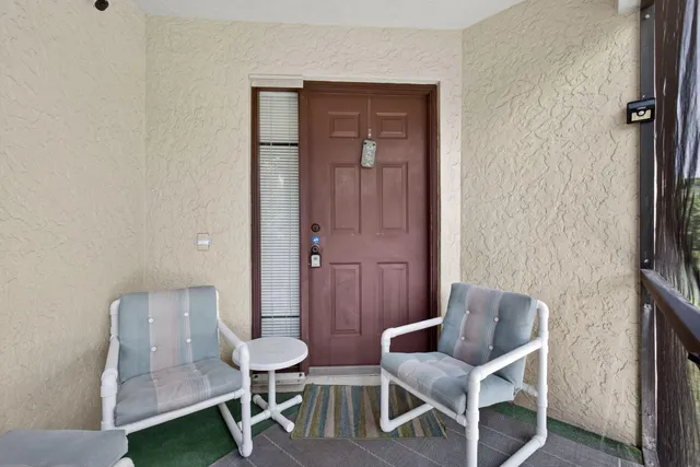 a view of a livingroom with furniture and a livingroom