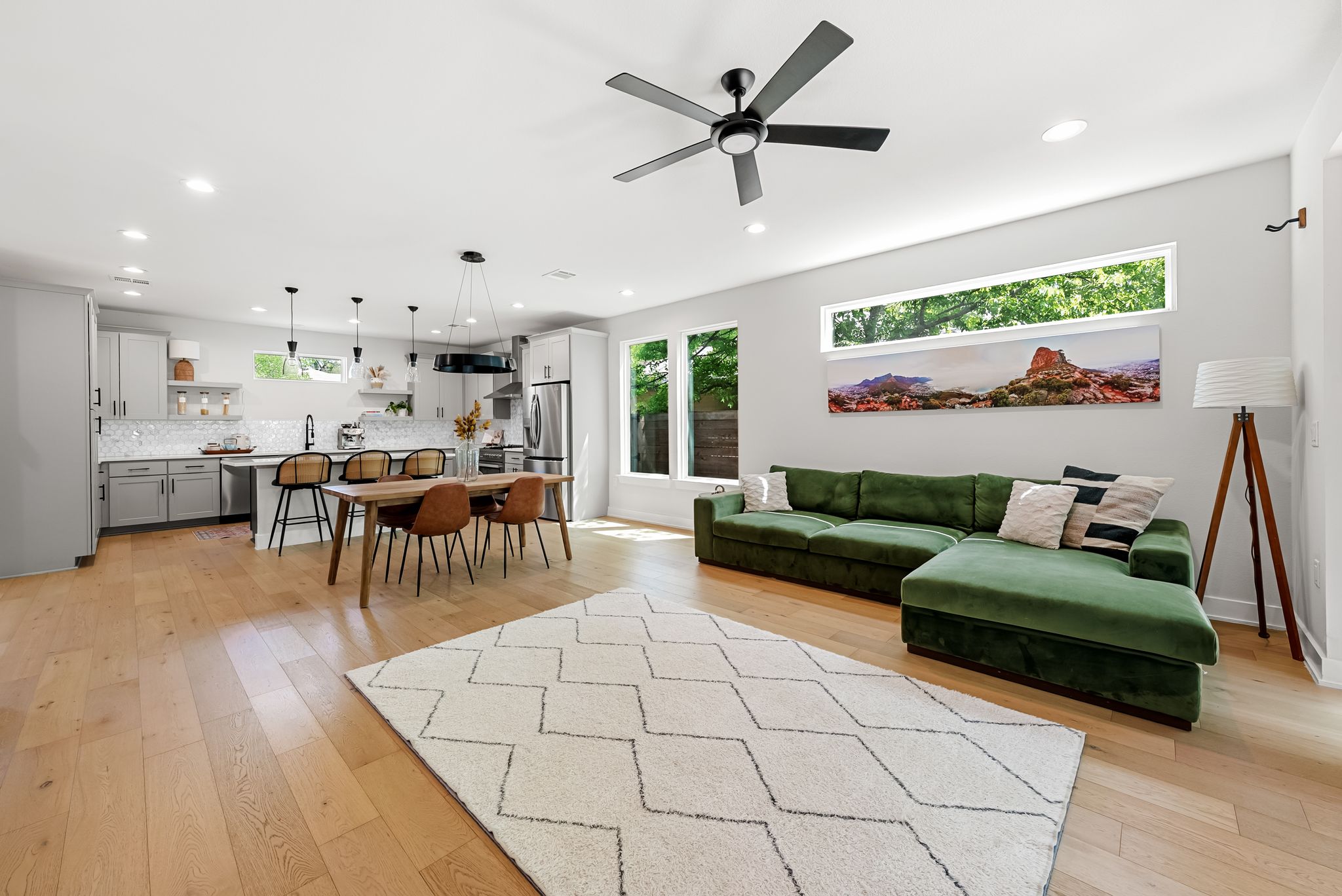 5109 Stone Gate Drive, Unit 1 Austin, TX 78721 - Photo 13 of 36 a living room with furniture and a large window
