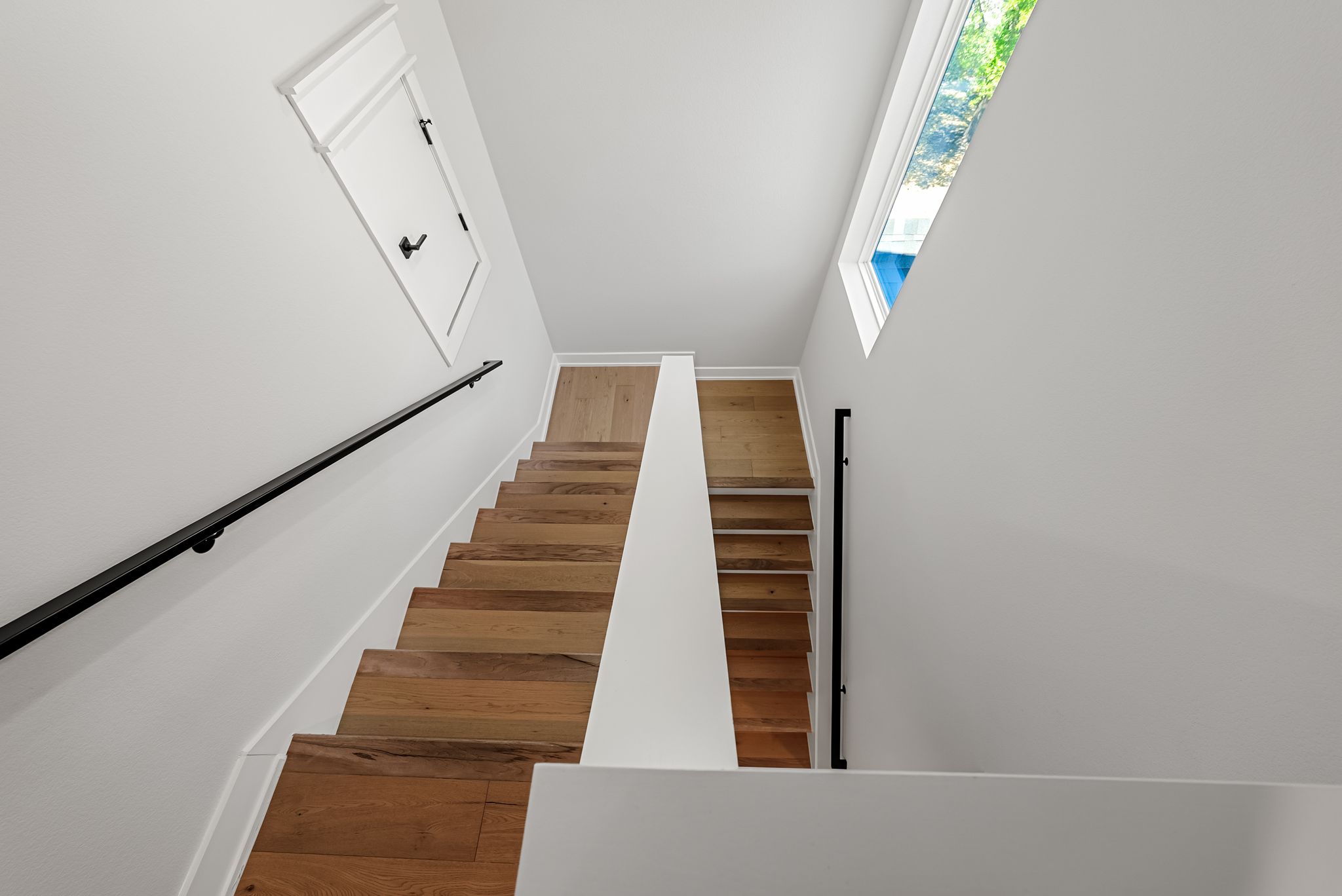 5109 Stone Gate Drive, Unit 1 Austin, TX 78721 - Photo 25 of 36 a view of entryway with wooden floor