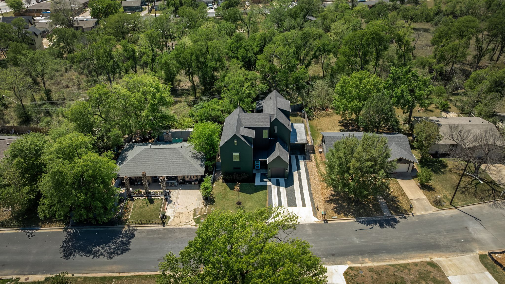 5109 Stone Gate Drive, Unit 1 Austin, TX 78721 - Photo 36 of 36 an aerial view of houses with yard