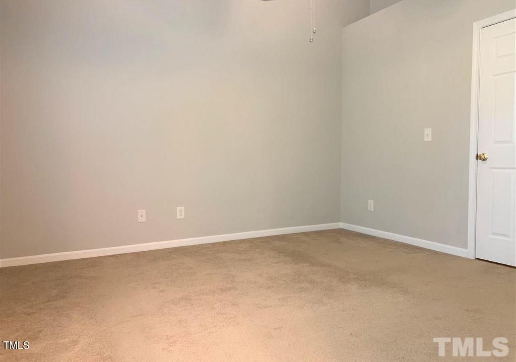 142 Forthview Way Apex, NC 27502 - Photo 8 of 11 a view of an empty room