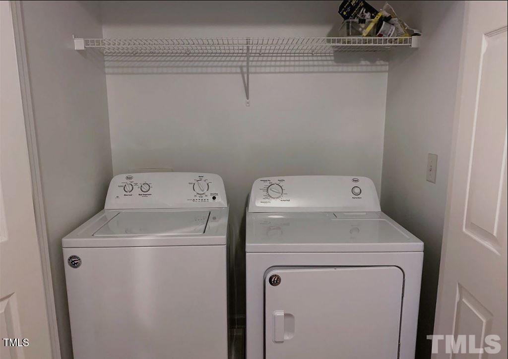 142 Forthview Way Apex, NC 27502 - Photo 10 of 11 a utility room with dryer and washer