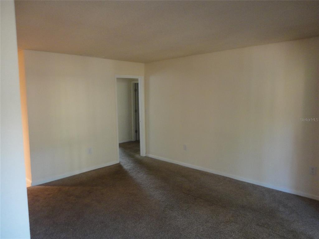 1810 Northwest 23rd Boulevard, Unit 207 Gainesville, FL 32605 - Photo 12 of 14 a view of an empty room