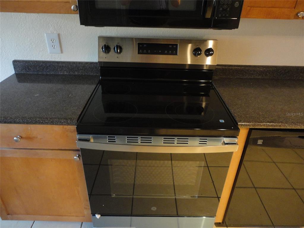 1810 Northwest 23rd Boulevard, Unit 207 Gainesville, FL 32605 - Photo 14 of 14 a close up of a fireplace