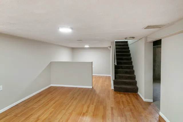 a view of entryway with wooden floor