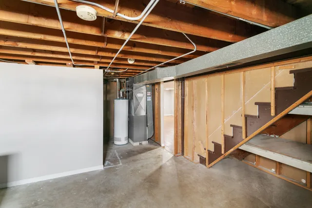 a view of an empty room with stairs