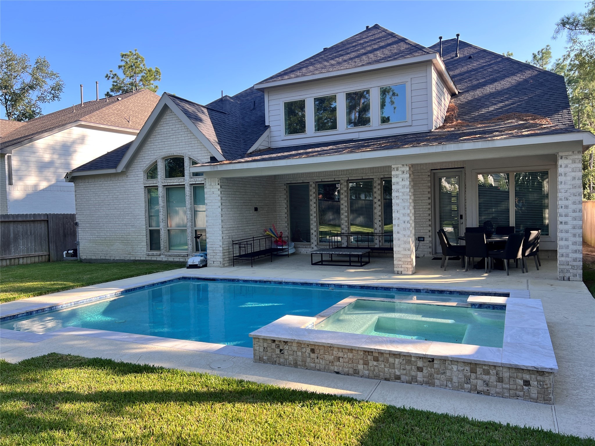176 Sweeping Valley Drive Montgomery, TX 77316 - Photo 1 of 50 a view of a house with swimming pool and sitting area