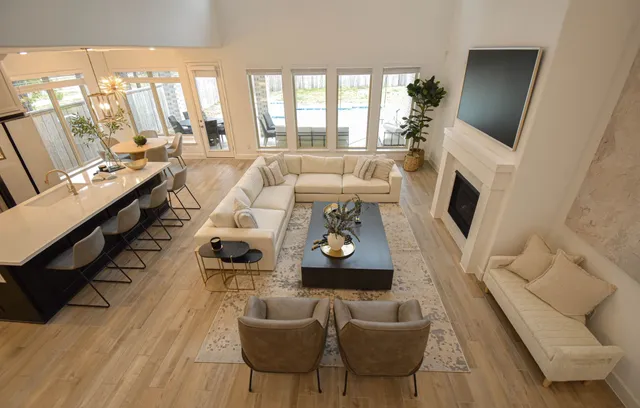 a view of a dining room with furniture and a window
