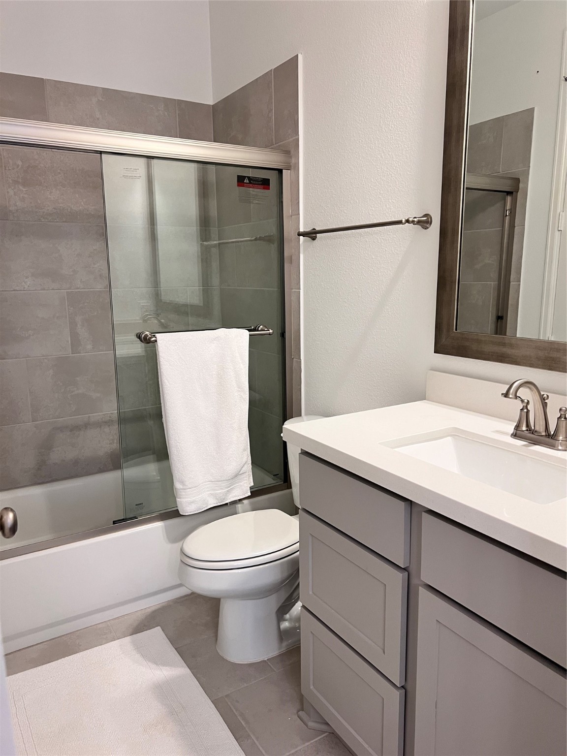 176 Sweeping Valley Drive Montgomery, TX 77316 - Photo 22 of 50 a bathroom with a granite countertop sink toilet and shower