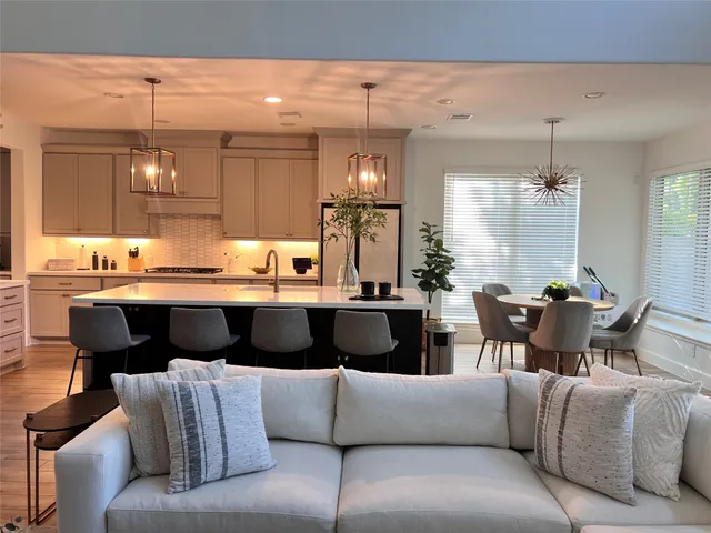 a bath tub sitting in a bathroom next to a window