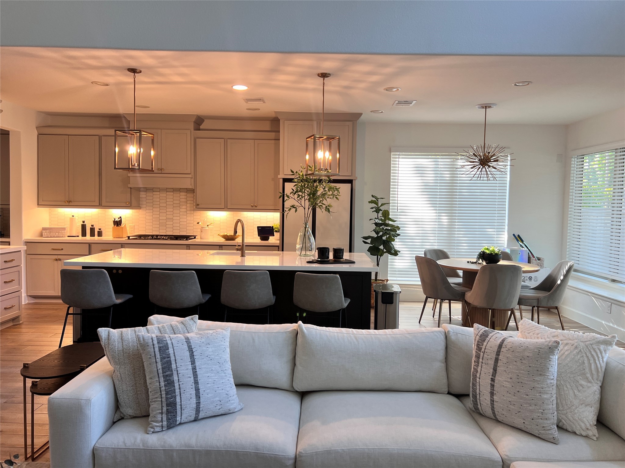 176 Sweeping Valley Drive Montgomery, TX 77316 - Photo 25 of 50 a living room with furniture kitchen view and a chandelier