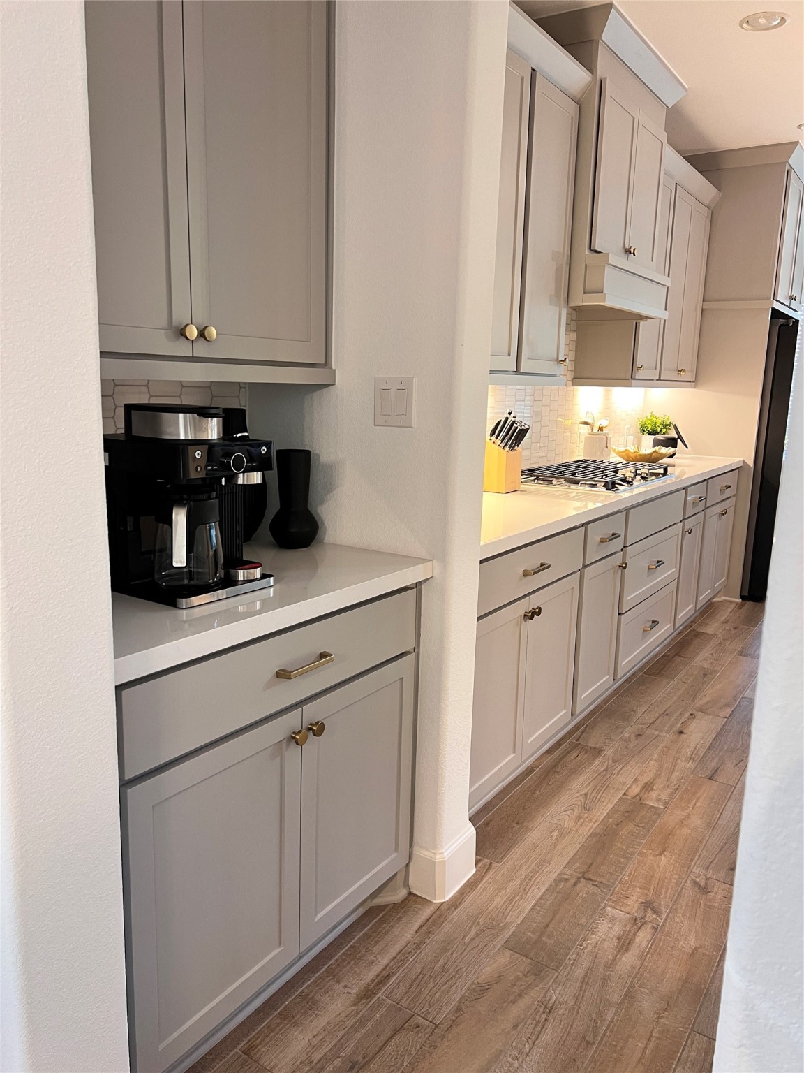 176 Sweeping Valley Drive Montgomery, TX 77316 - Photo 28 of 50 a kitchen with granite countertop white cabinets and white appliances
