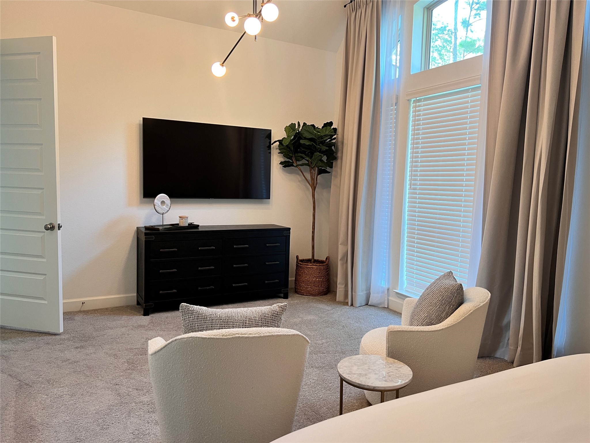 176 Sweeping Valley Drive Montgomery, TX 77316 - Photo 30 of 50 a living room with furniture and a flat screen tv