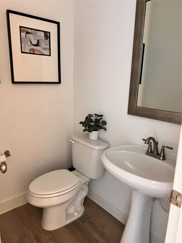 a view of hallway with livingroom