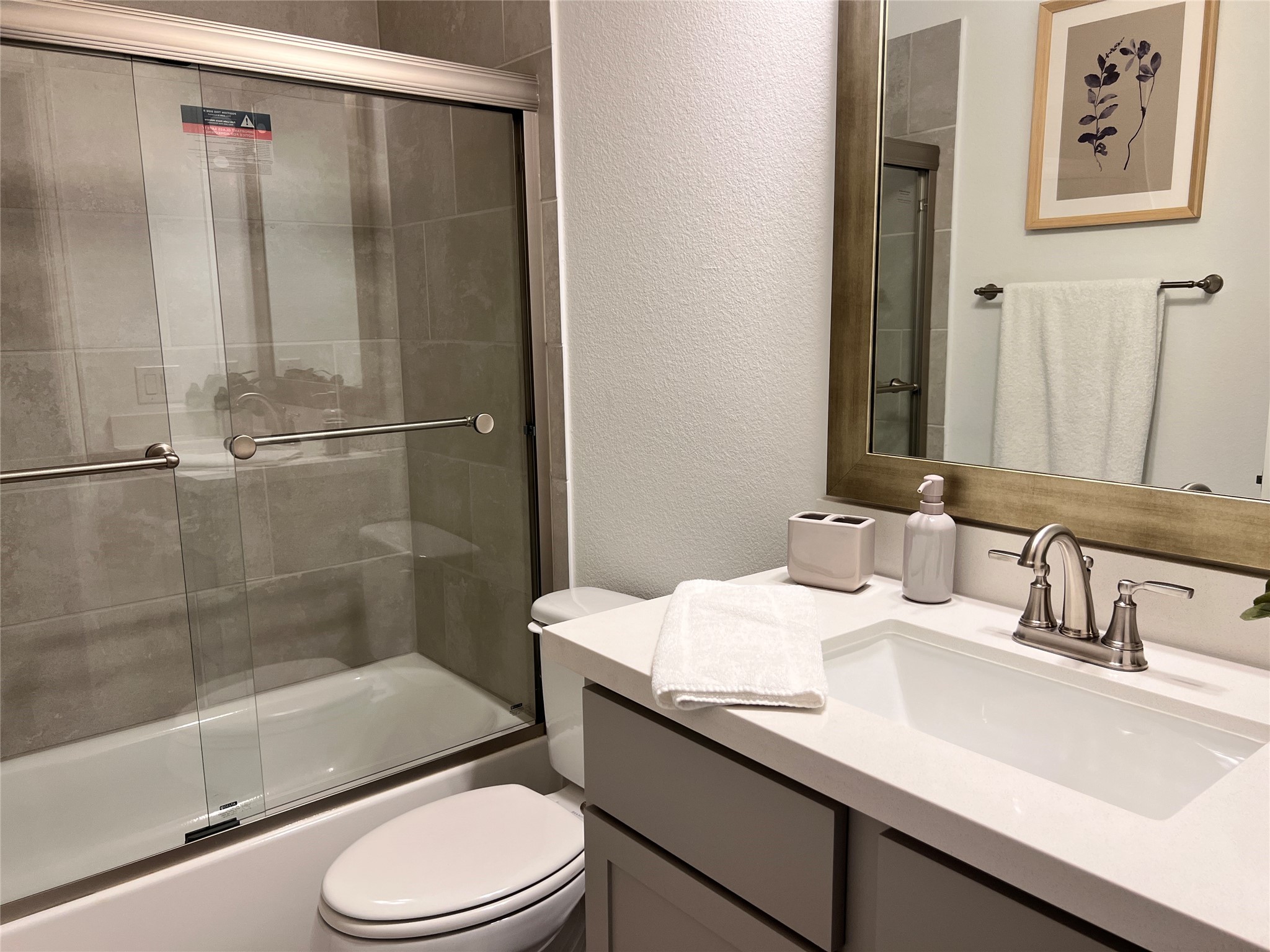 176 Sweeping Valley Drive Montgomery, TX 77316 - Photo 38 of 50 a bathroom with a sink and a mirror