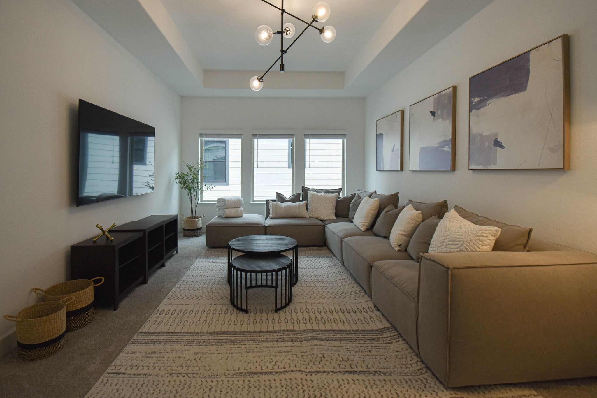 176 Sweeping Valley Drive Montgomery, TX 77316 - Photo 10 of 50 a living room with furniture and a flat screen tv