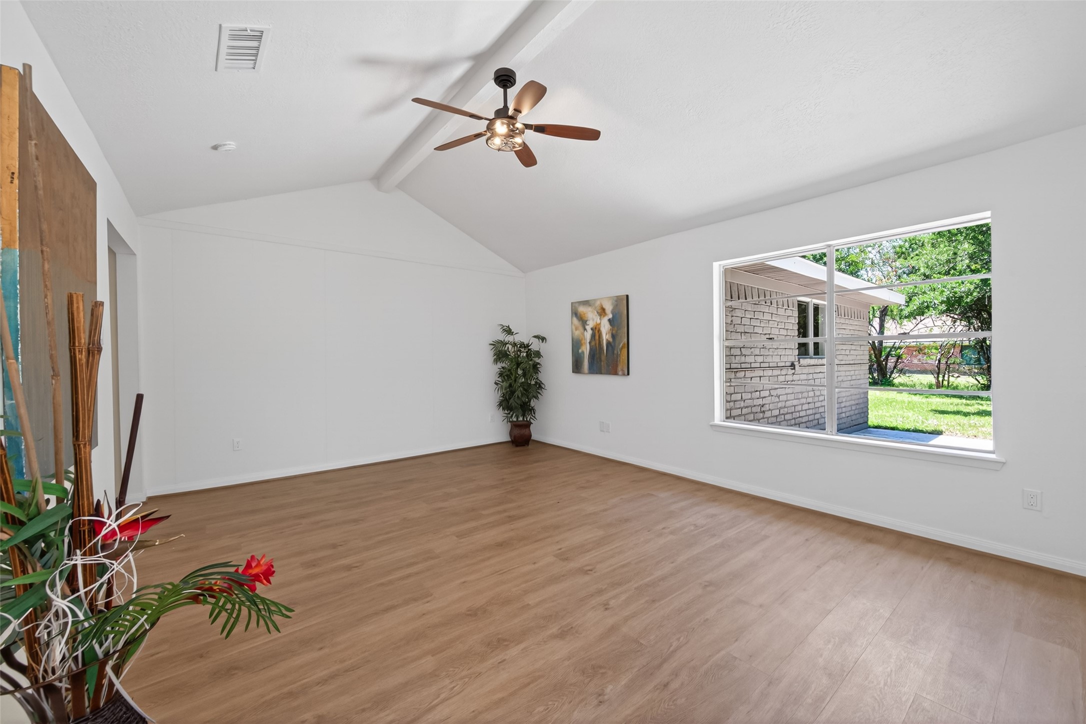 503 Allison Street Conroe, TX 77303 - Photo 7 of 34 Spacious living room featuring fresh paint and new carpet, perfect for modern living.