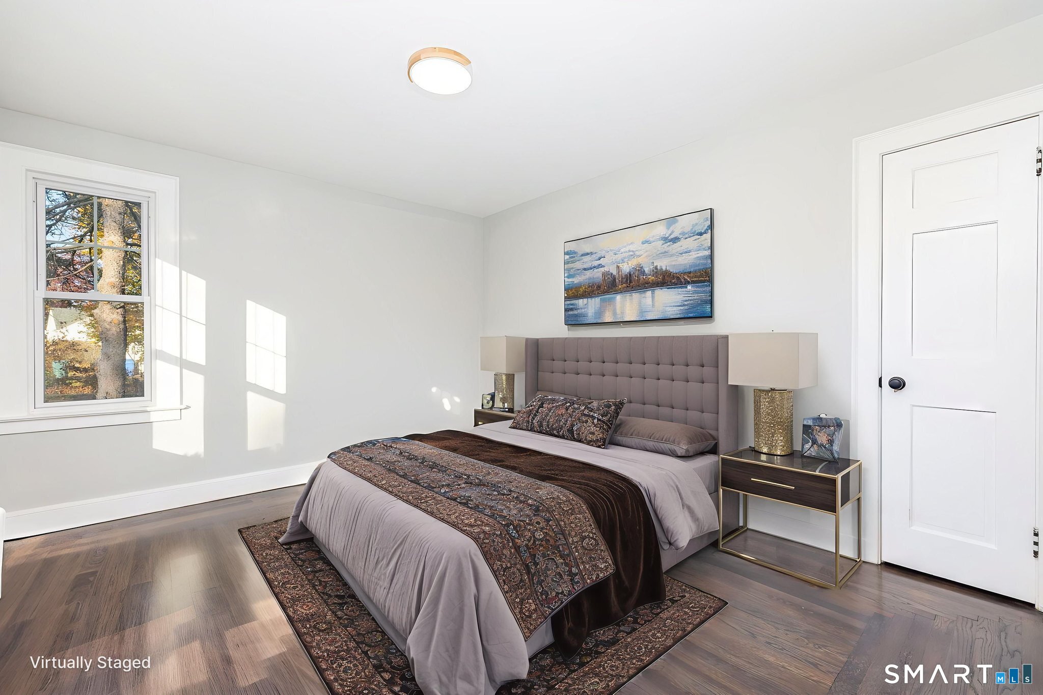 51 Hepburn Road Hamden, CT 06517 - Photo 13 of 40 a bed sitting in a bedroom next to a window