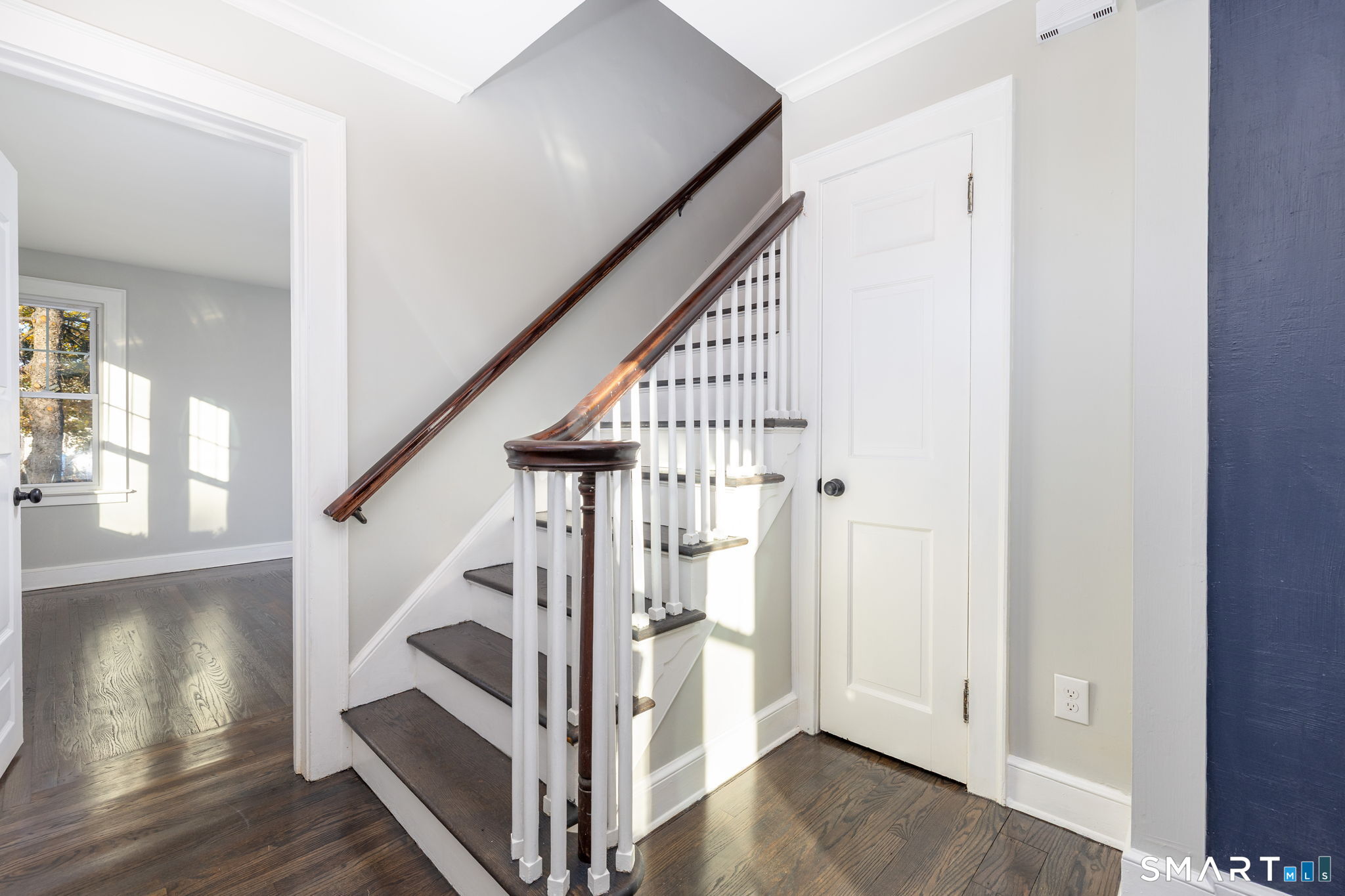 51 Hepburn Road Hamden, CT 06517 - Photo 17 of 40 a view of staircase with wooden floor and white walls