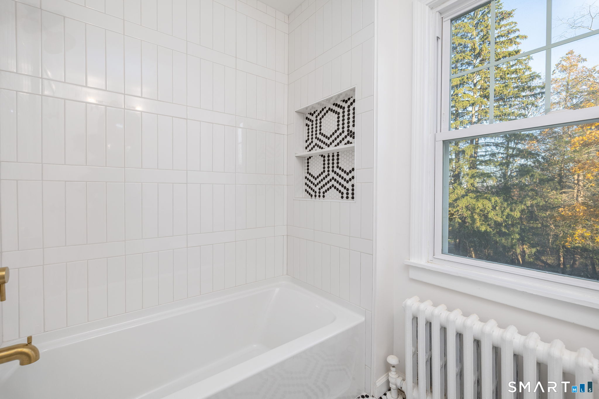 51 Hepburn Road Hamden, CT 06517 - Photo 22 of 40 a bathroom with a bathtub and a shower