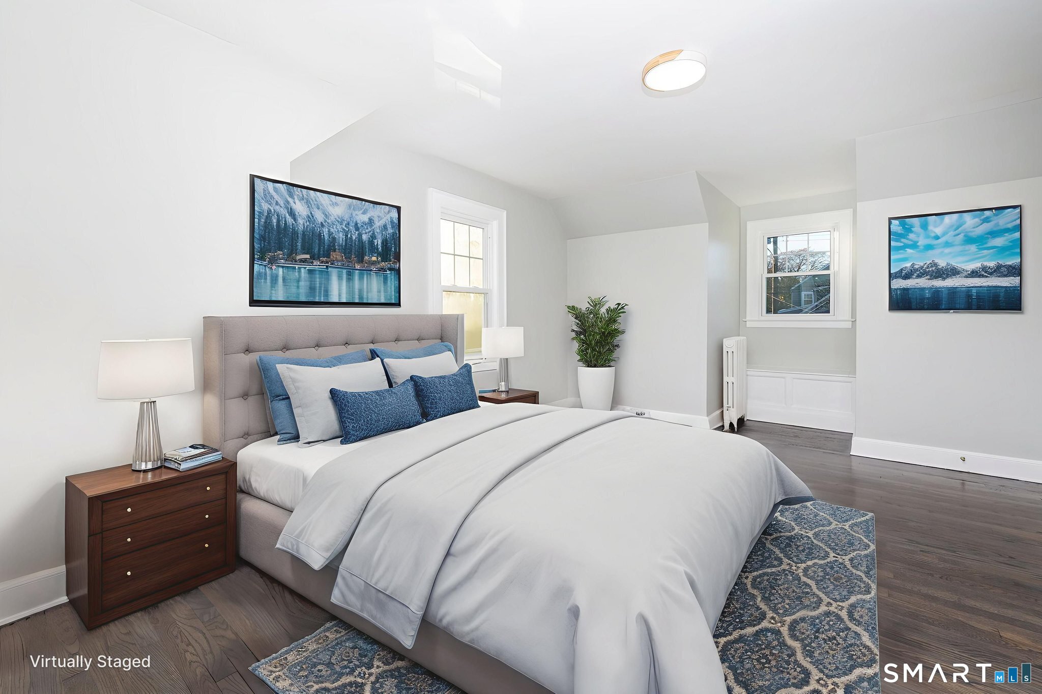 51 Hepburn Road Hamden, CT 06517 - Photo 24 of 40 a bedroom with a bed and a painting on the wall