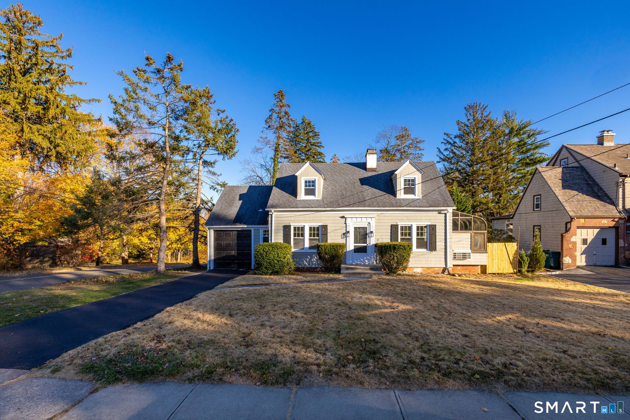51 Hepburn Road Hamden, CT 06517 - Photo 26 of 40 a front view of a house with a yard