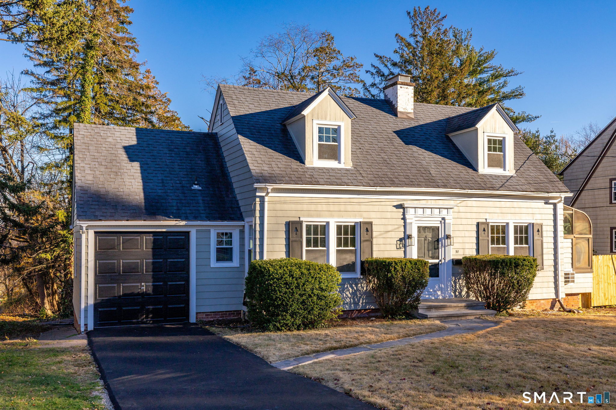 51 Hepburn Road Hamden, CT 06517 - Photo 27 of 40 front view of a house with a yard