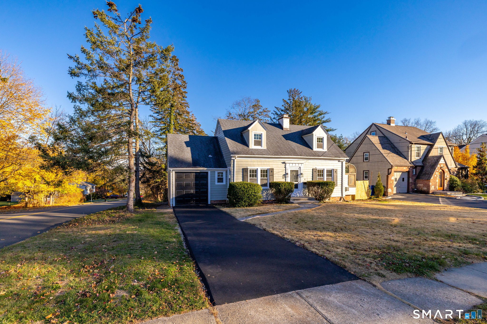 51 Hepburn Road Hamden, CT 06517 - Photo 29 of 40 a front view of a house with a yard