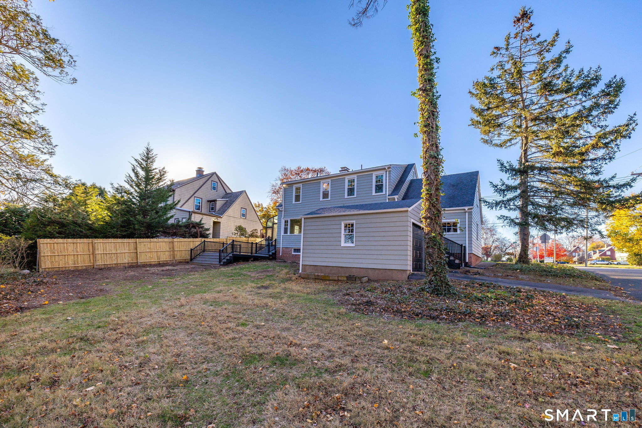 51 Hepburn Road Hamden, CT 06517 - Photo 32 of 40 a view of a house with a yard and large tree