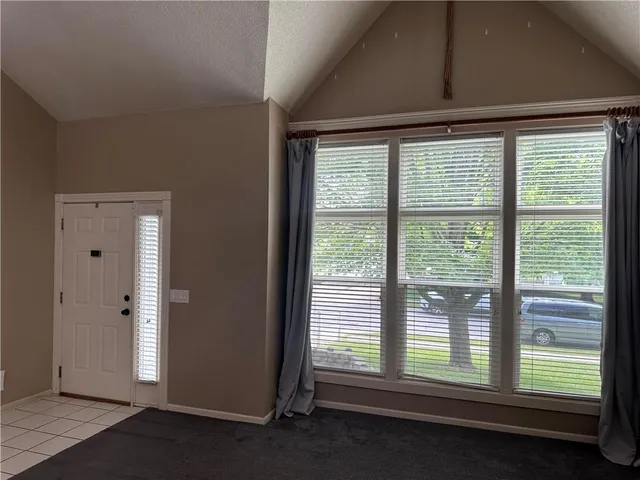 $395,000 | 208 Pacific Court, Raymore, MO 64083