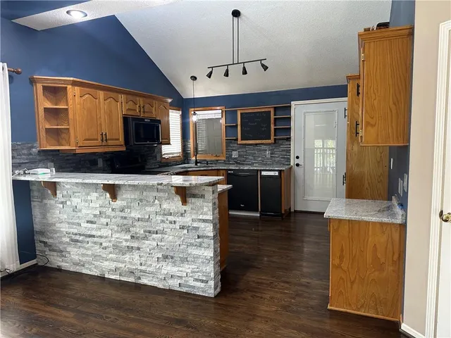 $395,000 | 208 Pacific Court, Raymore, MO 64083