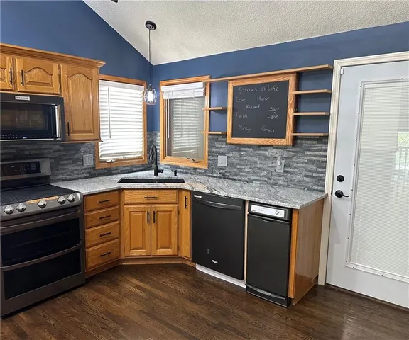 $395,000 | 208 Pacific Court, Raymore, MO 64083