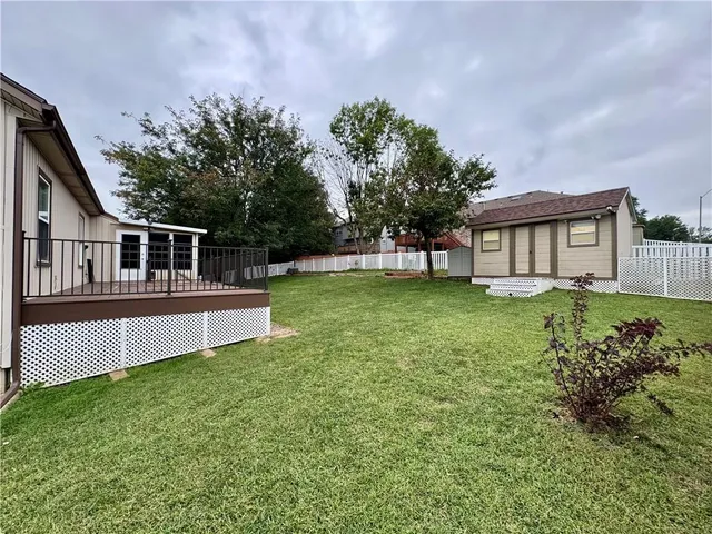 $395,000 | 208 Pacific Court, Raymore, MO 64083