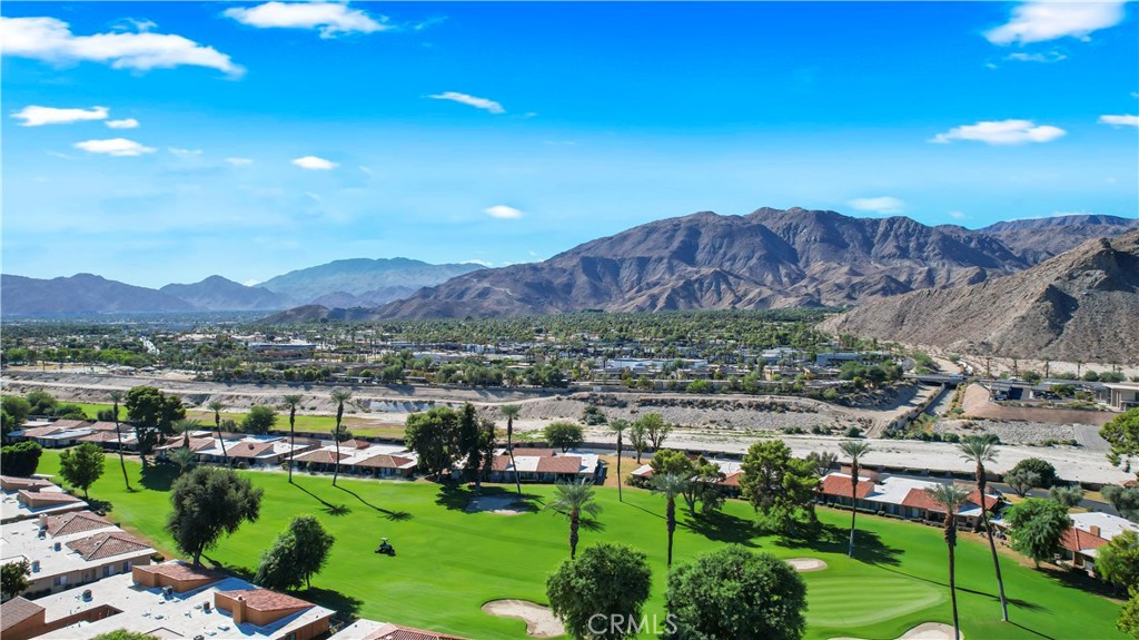48 Palma Drive Rancho Mirage, CA 92270 - Photo 28 of 32 a view of a city with garden