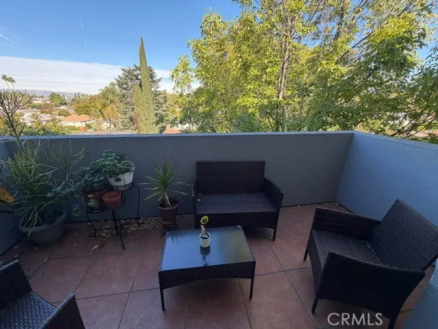 a view of patio with furniture
