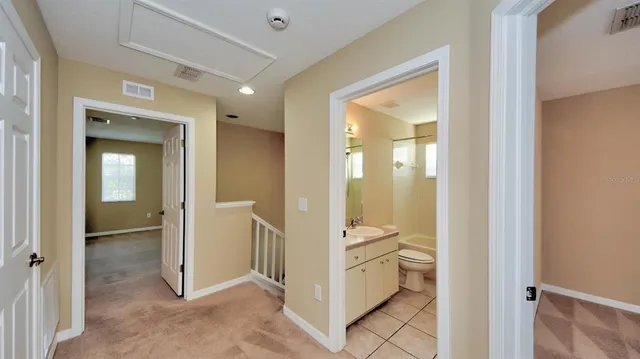 a view of a bathroom with toilet