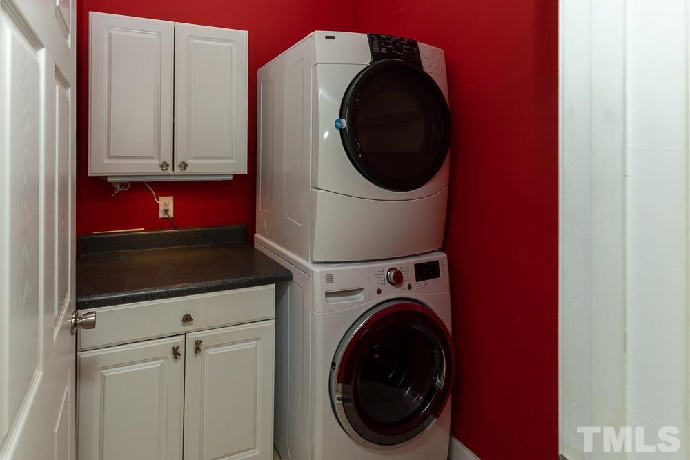 12625 Amoretto Way Raleigh, NC 27613 - Photo 16 of 42 a utility room with dryer and washer
