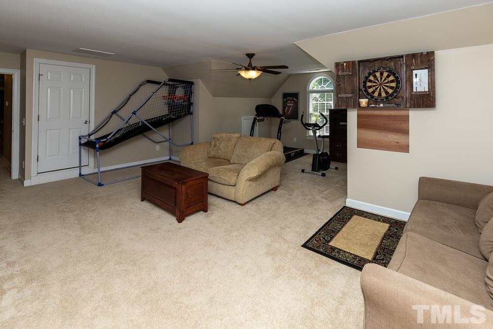 12625 Amoretto Way Raleigh, NC 27613 - Photo 23 of 42 a living room with furniture