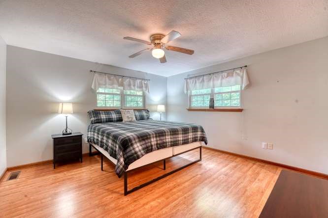 3333 Ellington Road Hayesville, NC 28904 - Photo 39 of 56 a bedroom with a bed and window