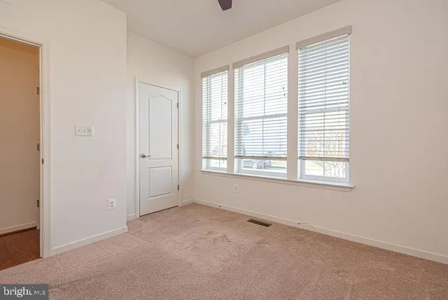 a view of storage and utility room with washer and dryer