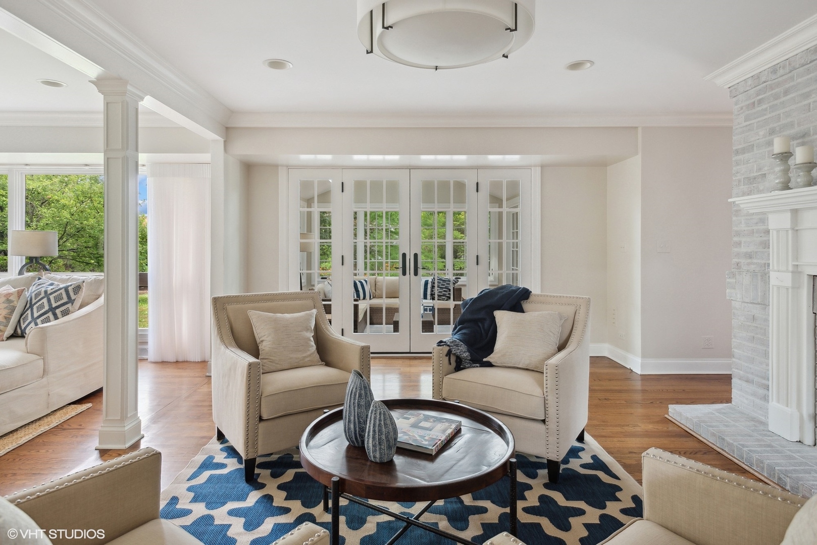2420 Dorina Drive Northfield, IL 60093 - Photo 13 of 51 a living room with furniture and a large window