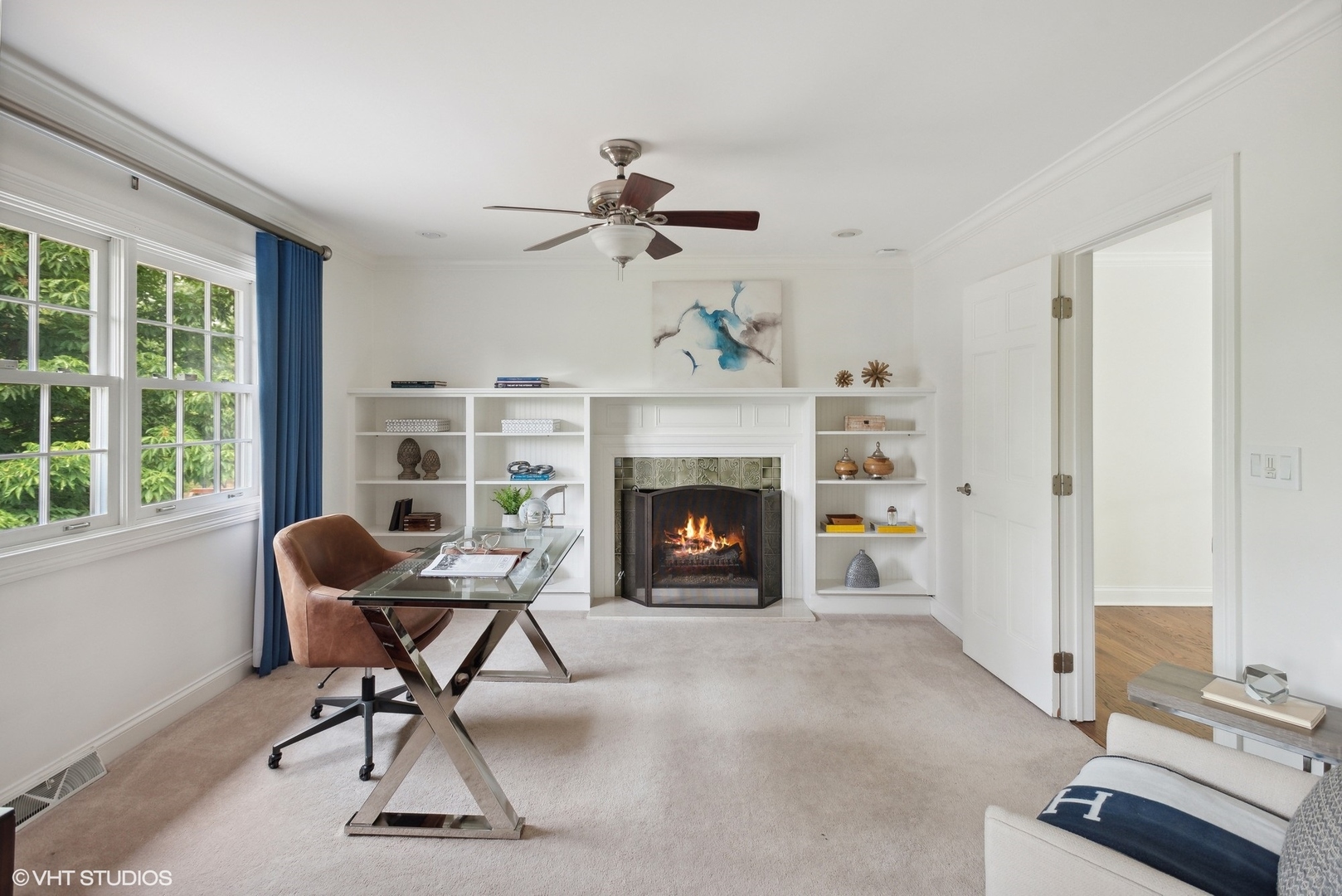 2420 Dorina Drive Northfield, IL 60093 - Photo 27 of 51 a living room with furniture and a fireplace
