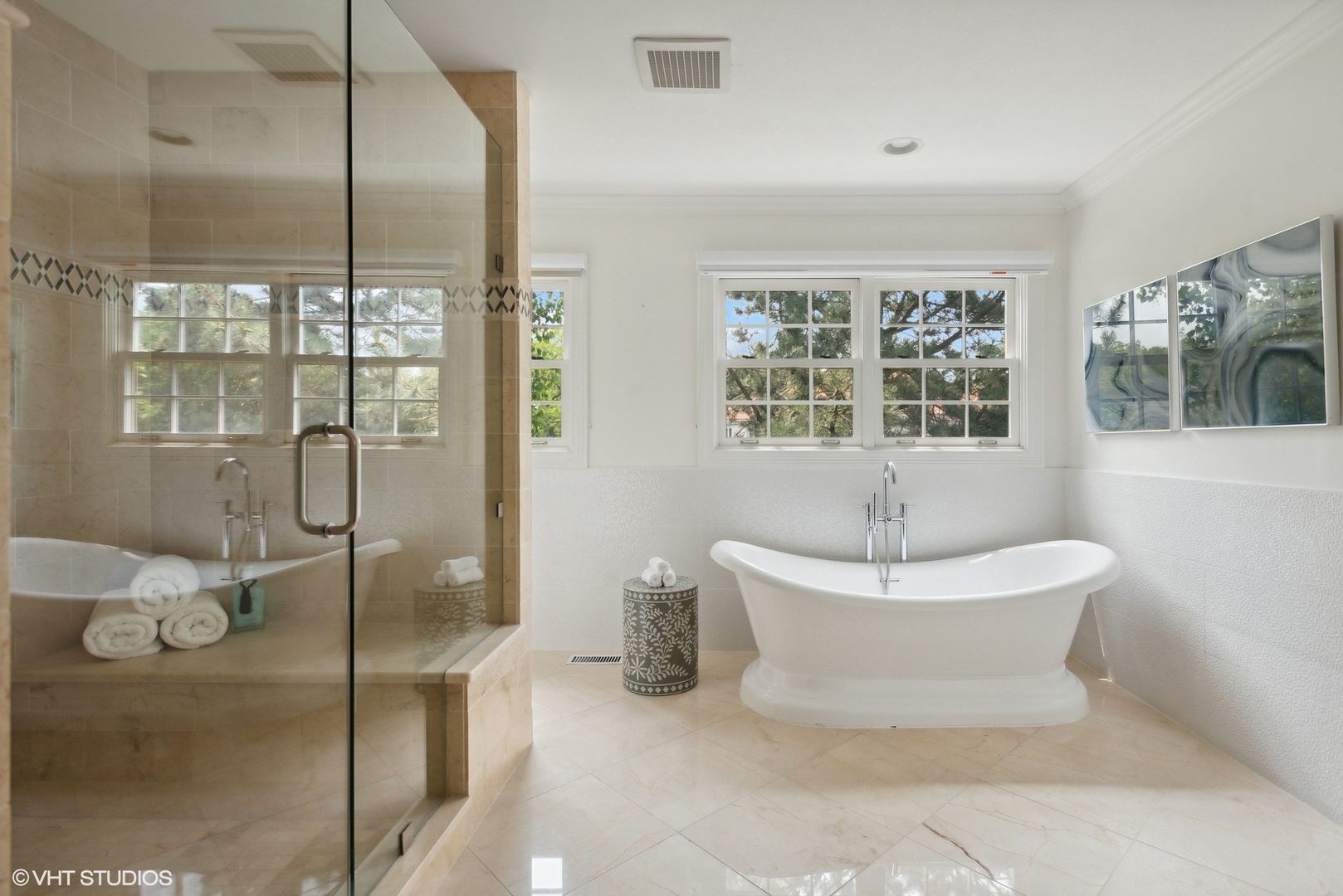 2420 Dorina Drive Northfield, IL 60093 - Photo 30 of 51 a spacious bathroom with a bathtub and next to a window