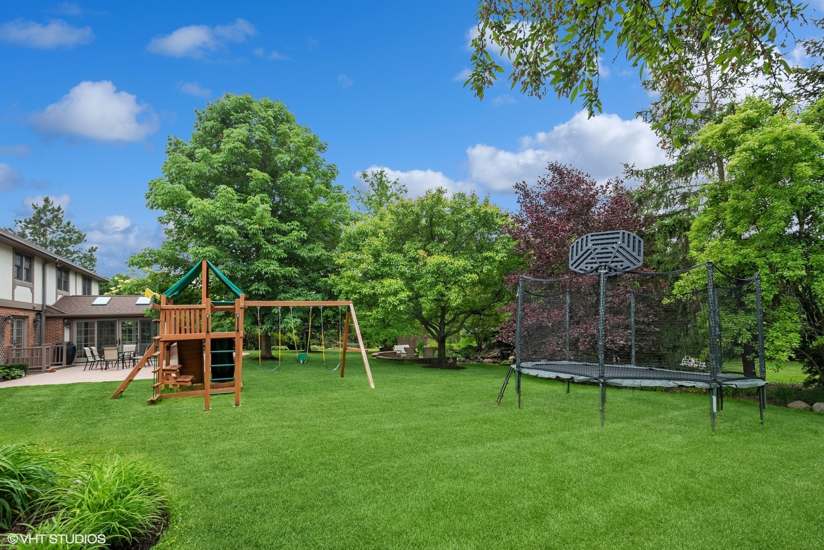2420 Dorina Drive Northfield, IL 60093 - Photo 44 of 51 a view of a house with a backyard porch and sitting area