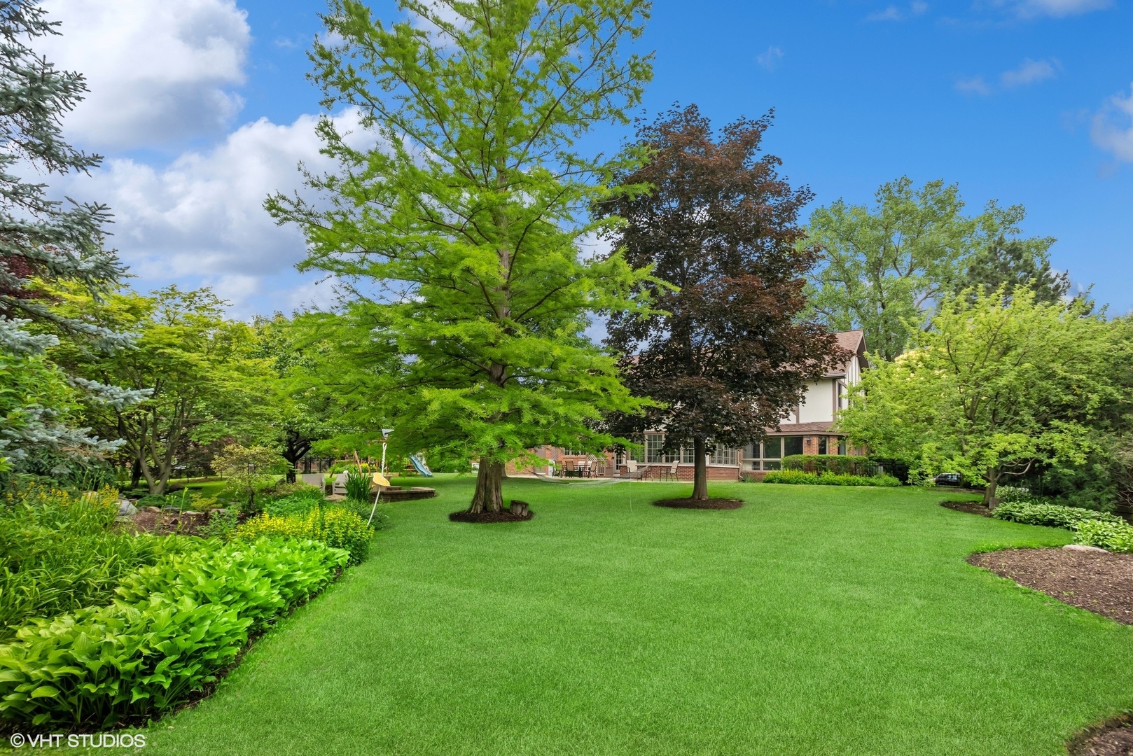 2420 Dorina Drive Northfield, IL 60093 - Photo 50 of 51 a view of yard with swimming pool and green space