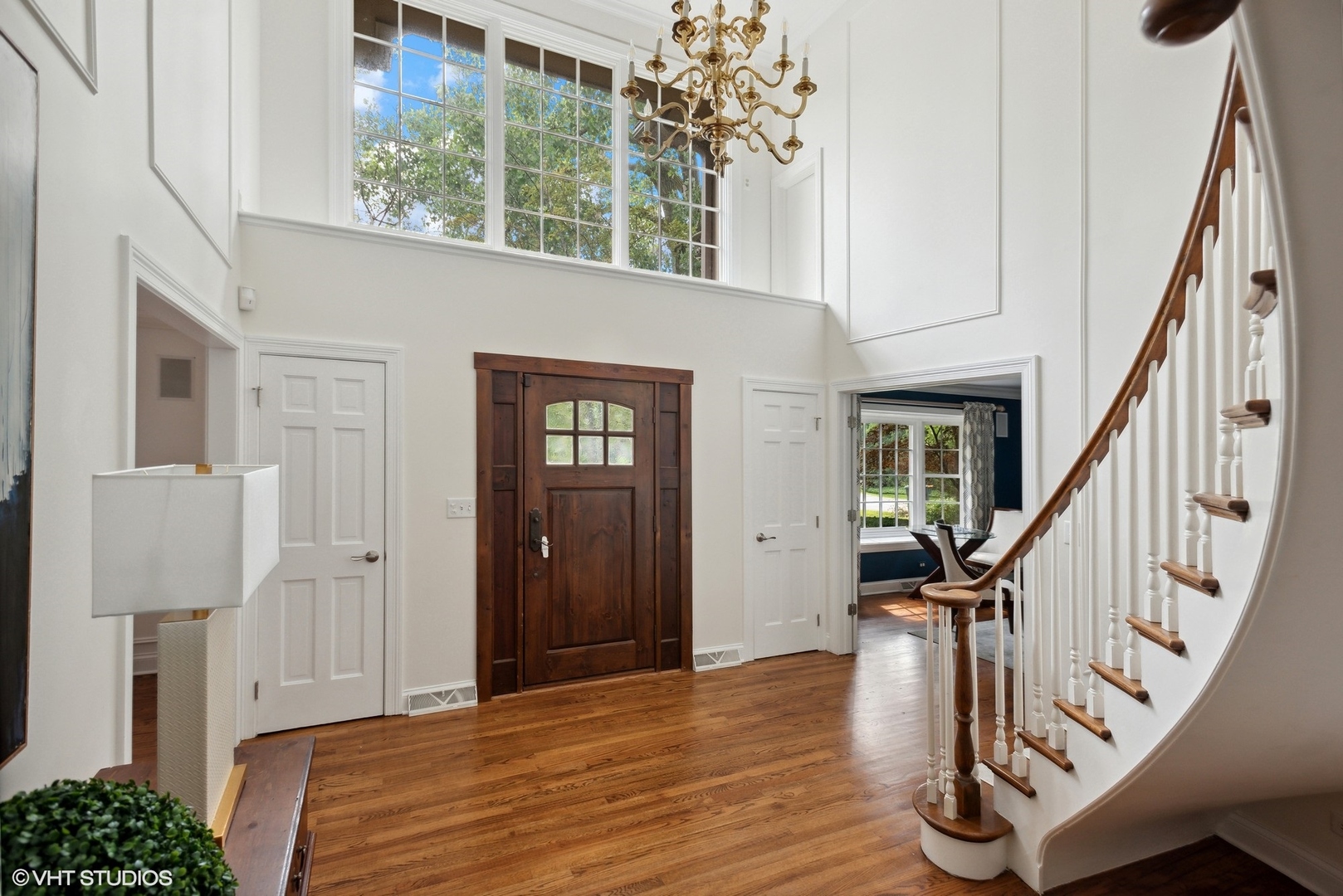 2420 Dorina Drive Northfield, IL 60093 - Photo 5 of 51 a view of entryway with wooden floor and front door
