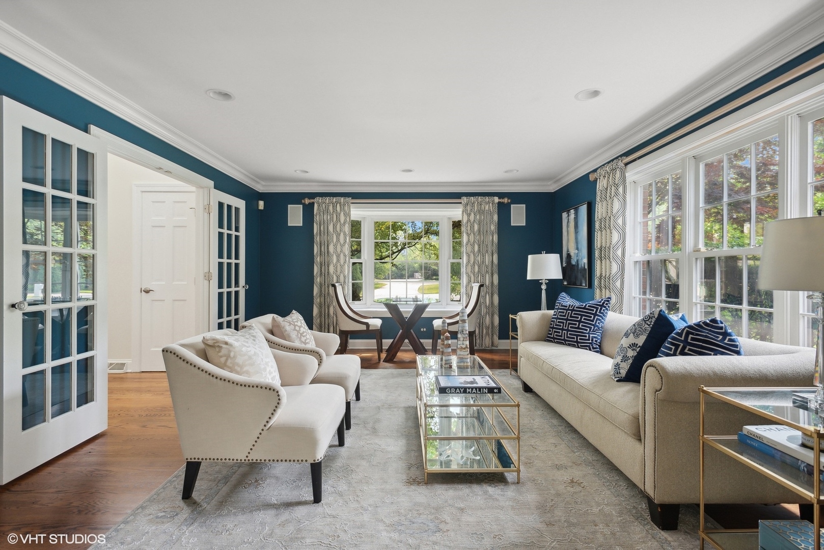 2420 Dorina Drive Northfield, IL 60093 - Photo 7 of 51 a living room with furniture and a large window