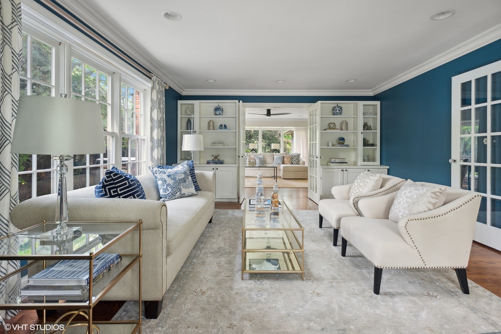 2420 Dorina Drive Northfield, IL 60093 - Photo 8 of 51 a living room with furniture and a table