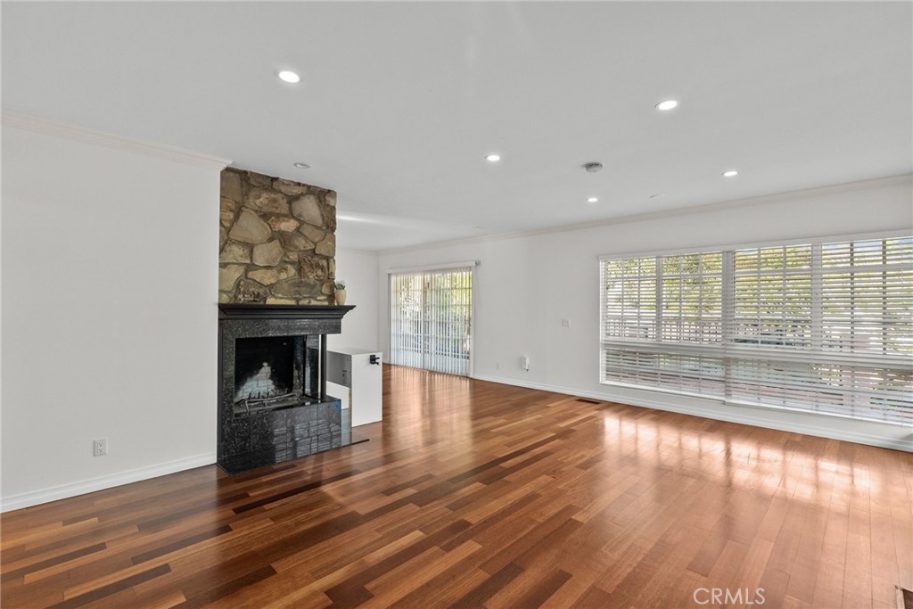 1519 Lynglen Drive Glendale, CA 91206 - Photo 11 of 39 a view of an empty room with wooden floor and a window