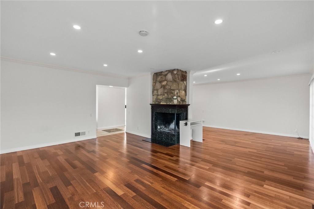 1519 Lynglen Drive Glendale, CA 91206 - Photo 12 of 39 a view of empty room with wooden floor